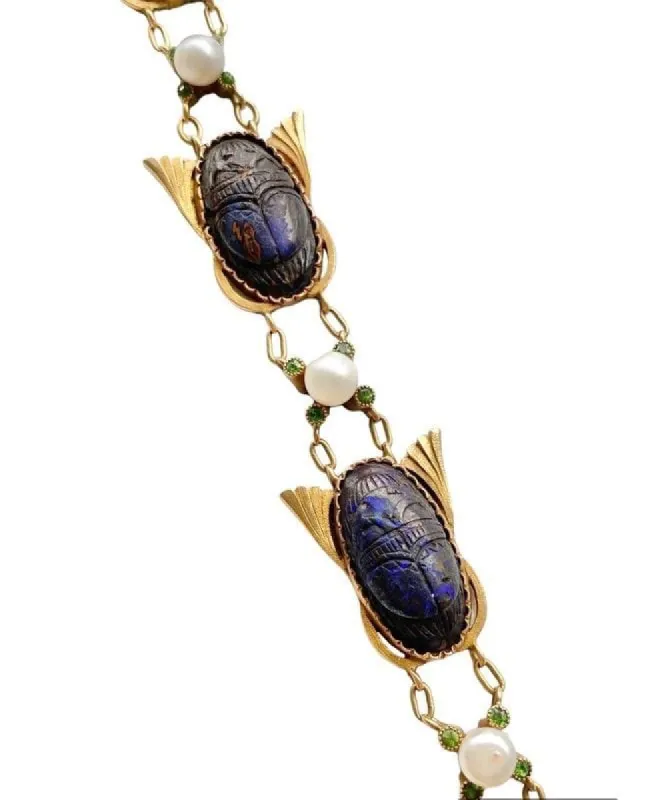 Bracelet Renouveau égyptien, or jaune et 6 scarabées opale sold by 58 Facettes