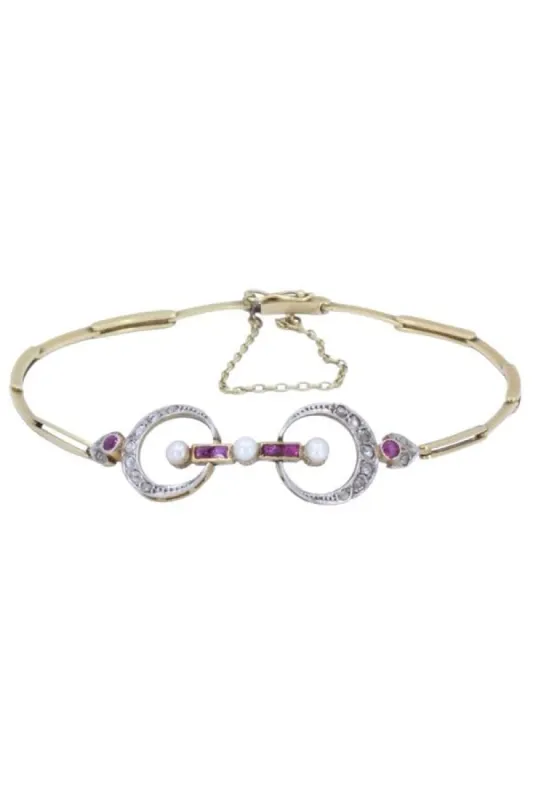 BRACELET ART NOUVEAU PERLES RUBIS ET DIAMANTS sold by 58 Facettes