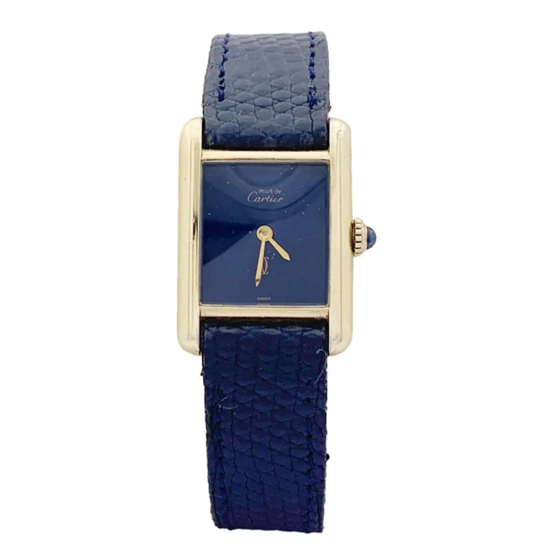 Montre Cartier "Tank Must" argent plaqué or, cadran laqué bleu. sold by 58 Facettes