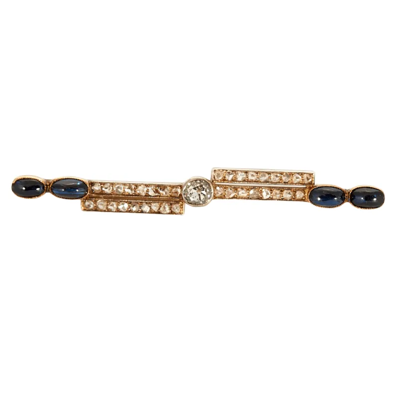 Broche barrette en or jaune, sertie de diamants et de saphirs cabochons. sold by 58 Facettes