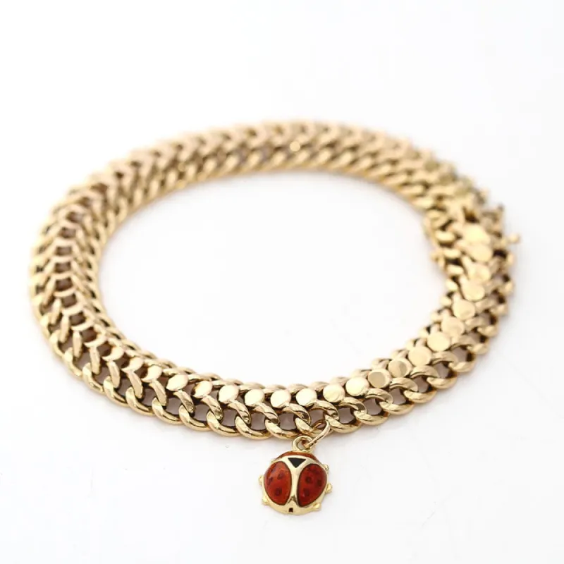 Bracelet en or jaune avec pendentif coccinelle sold by 58 Facettes