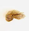 Broche Rétro Volute 1.30 Carats Diamants Or Jaune 18 Carats sold by 58 Facettes