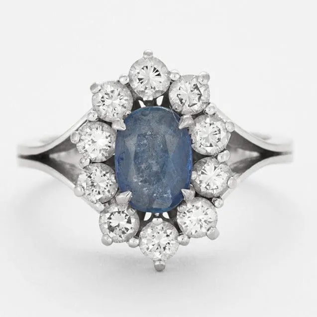 Bague marguerite en or gris, saphir et diamants sold by 58 Facettes