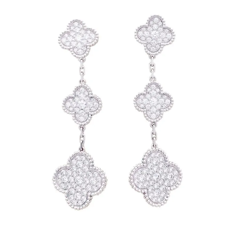 Boucles d'oreilles Van Cleef & Arpels "Magic Alhambra" or blanc, diamants. made by 58 Facettes