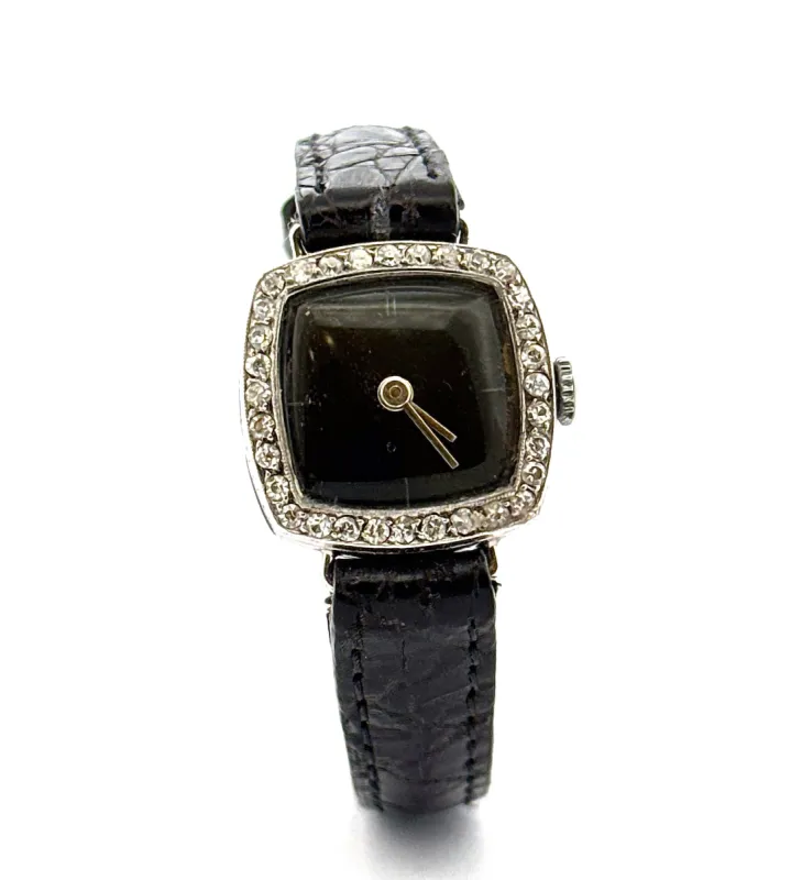 Montre ancienne classique boîtier or et entourage diamants sold by 58 Facettes