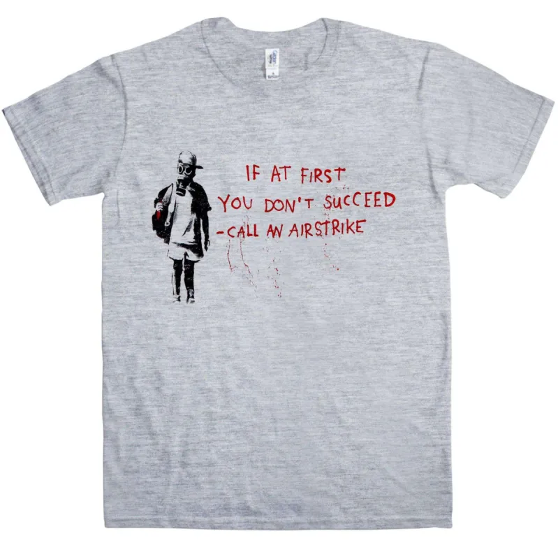 Banksy Call An Airstrike T-Shirt sold by 8Ball