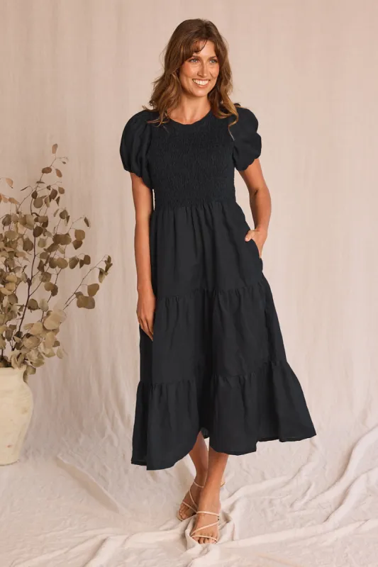 Minden Linen Shirred Short Sleeve Dress in Black sold by Adrift
