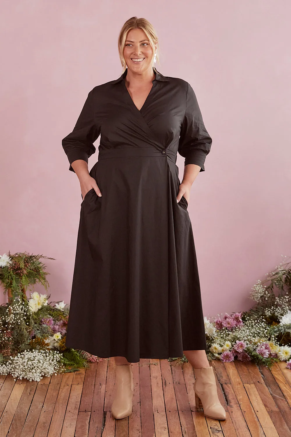 Wendy Poplin Wrap Dress in Black sold by Adrift