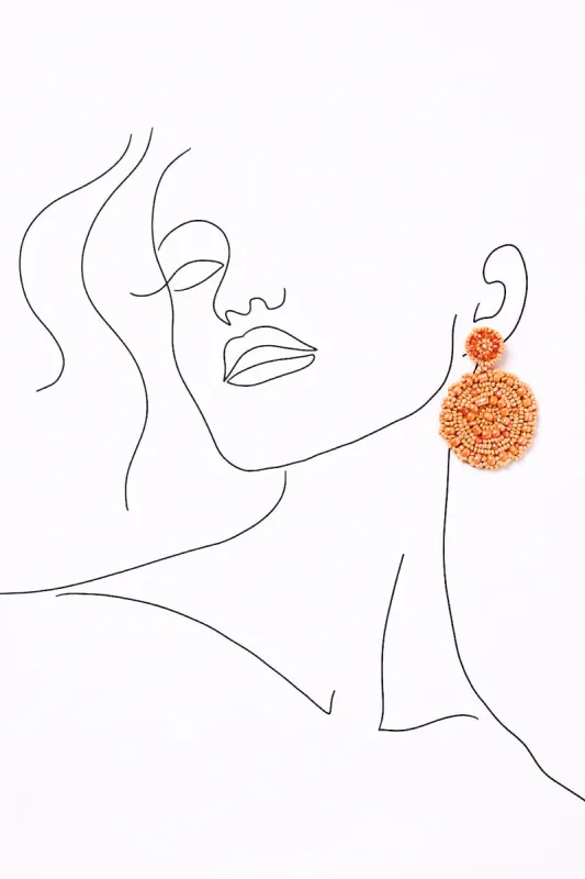 Boho Beaded Earrings in Orange sold by Adrift