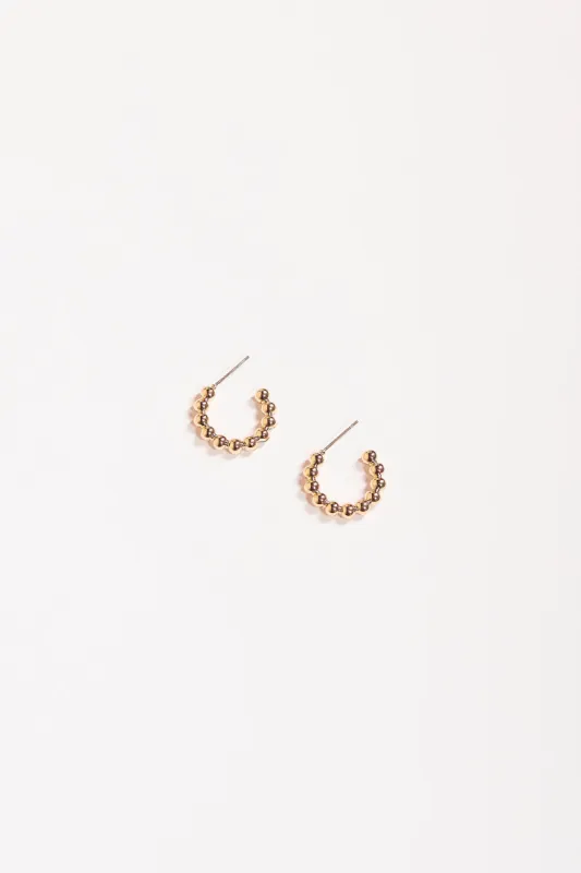 Macey Mini Cast Ball Hoops in Gold sold by Adrift