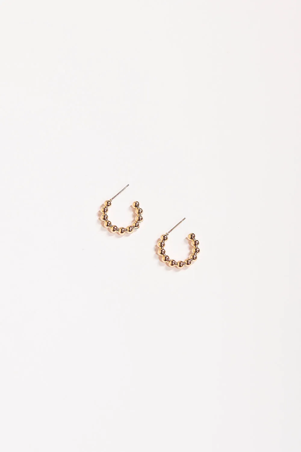 Macey Mini Cast Ball Hoops in Gold sold by Adrift