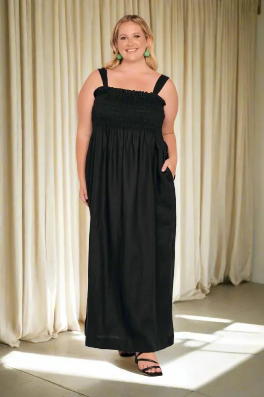 Sherry Linen Strapless Maxi Dress in Black sold by Adrift