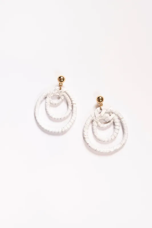 Three Hoop Drop Earrings in White sold by Adrift
