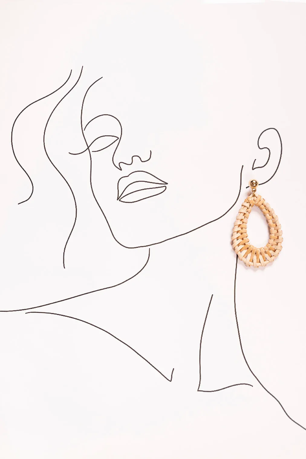 Oval Raffia Earrings in Natural sold by Adrift product image thumbnail 2