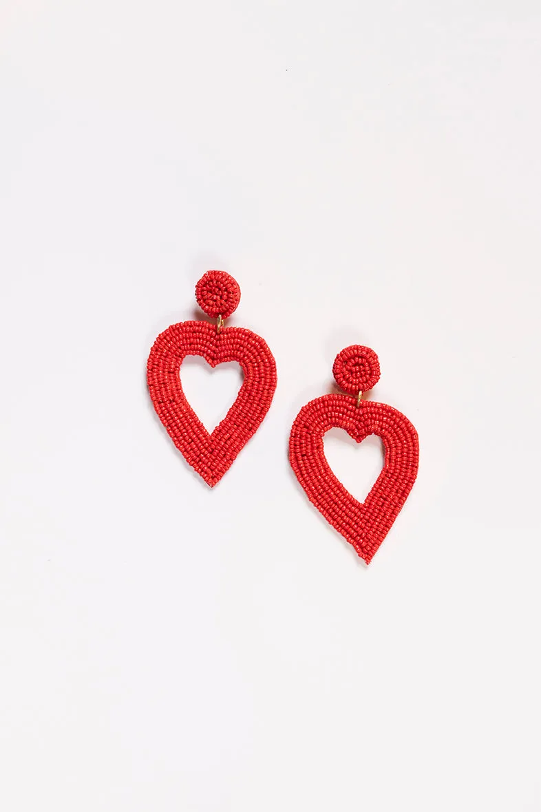 Hollow Heart Beaded Earrings in Red sold by Adrift