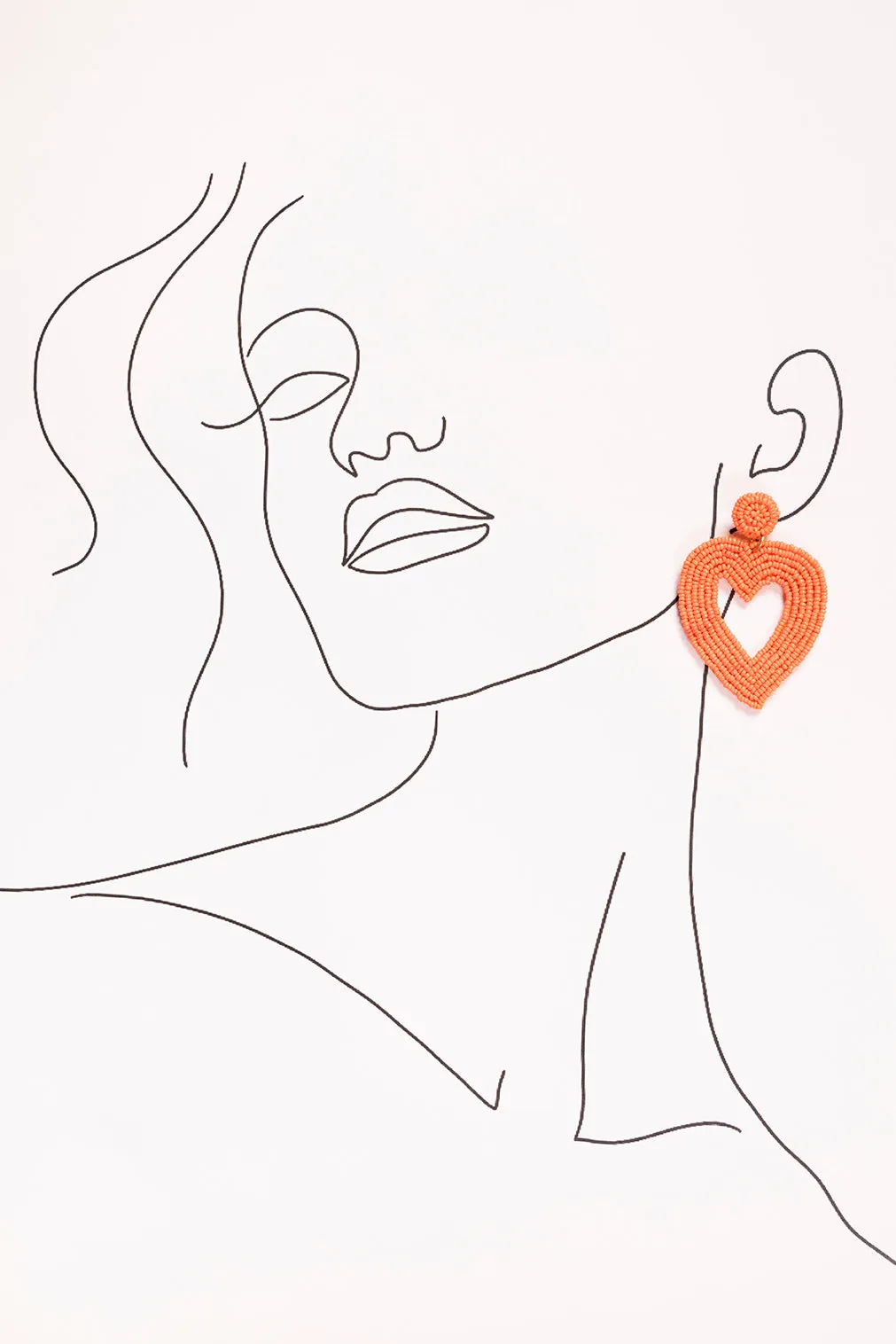 Hollow Heart Beaded Earrings in Orange sold by Adrift product image thumbnail 2