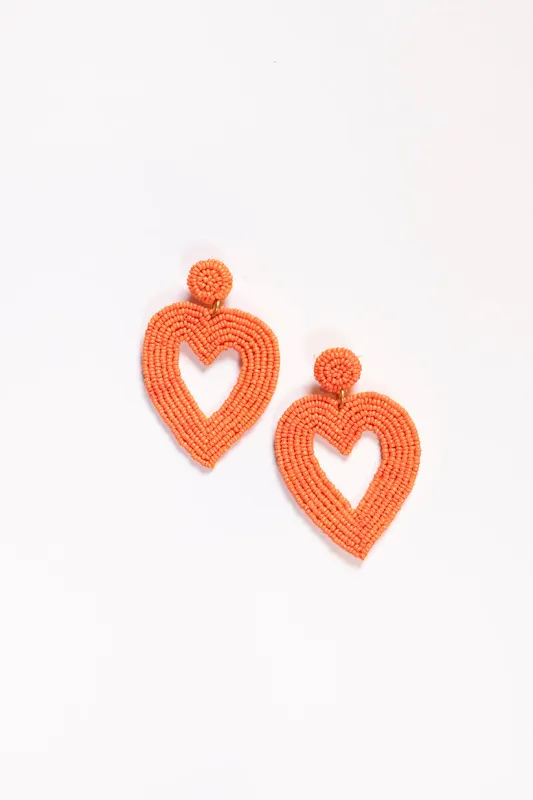 Hollow Heart Beaded Earrings in Orange sold by Adrift