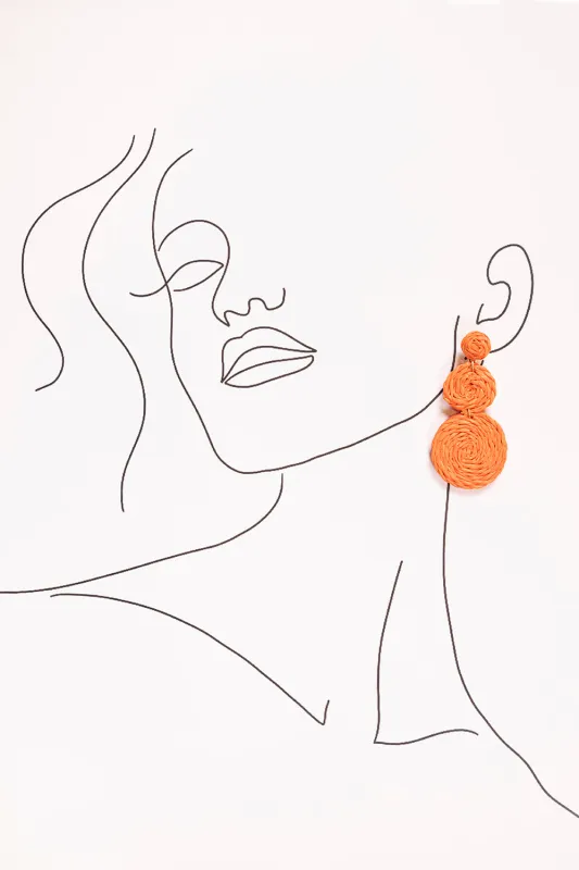 Woven Drop Earrings in Orange sold by Adrift