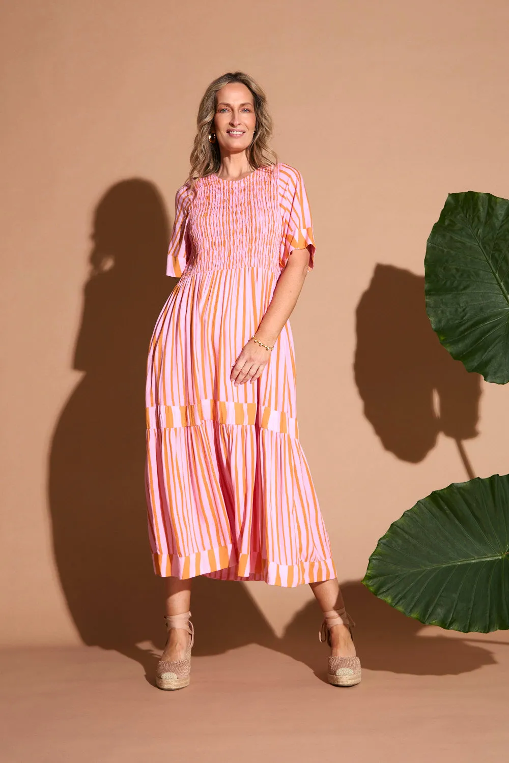 Minden Shirred Dress in Coral Spring sold by Adrift