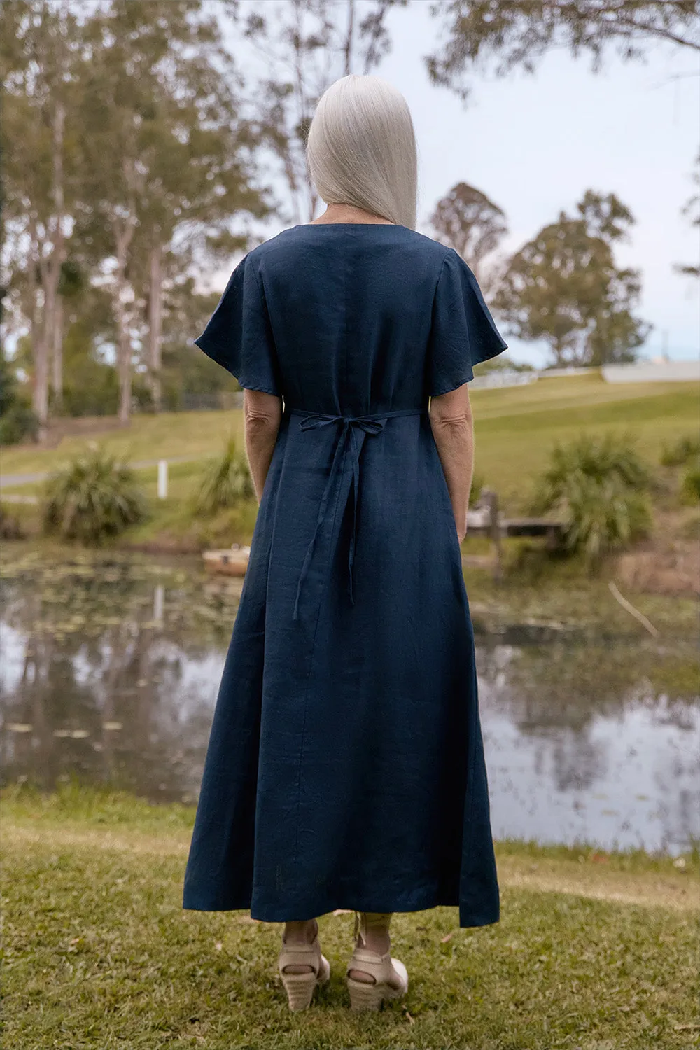 Tatum Linen Flutter Sleeve Dress in Navy sold by Adrift product image thumbnail 4