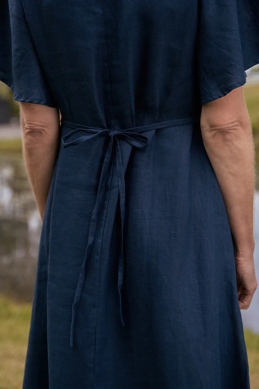 Tatum Linen Flutter Sleeve Dress in Navy sold by Adrift product image thumbnail 2