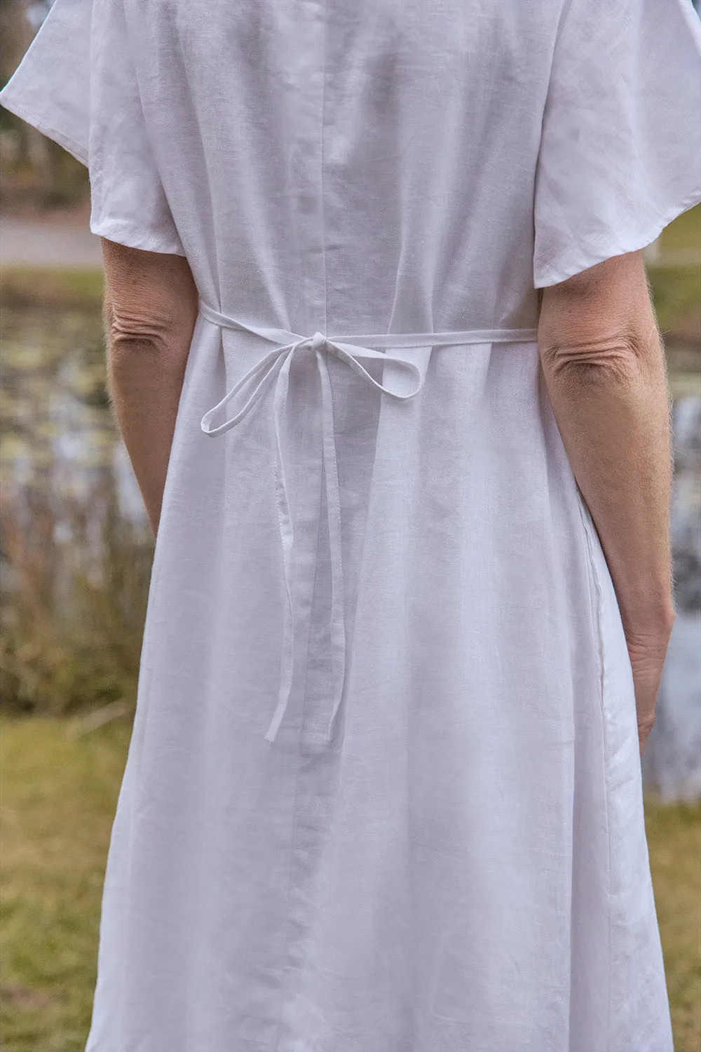 Tatum Linen Flutter Sleeve Dress in White sold by Adrift product image thumbnail 2