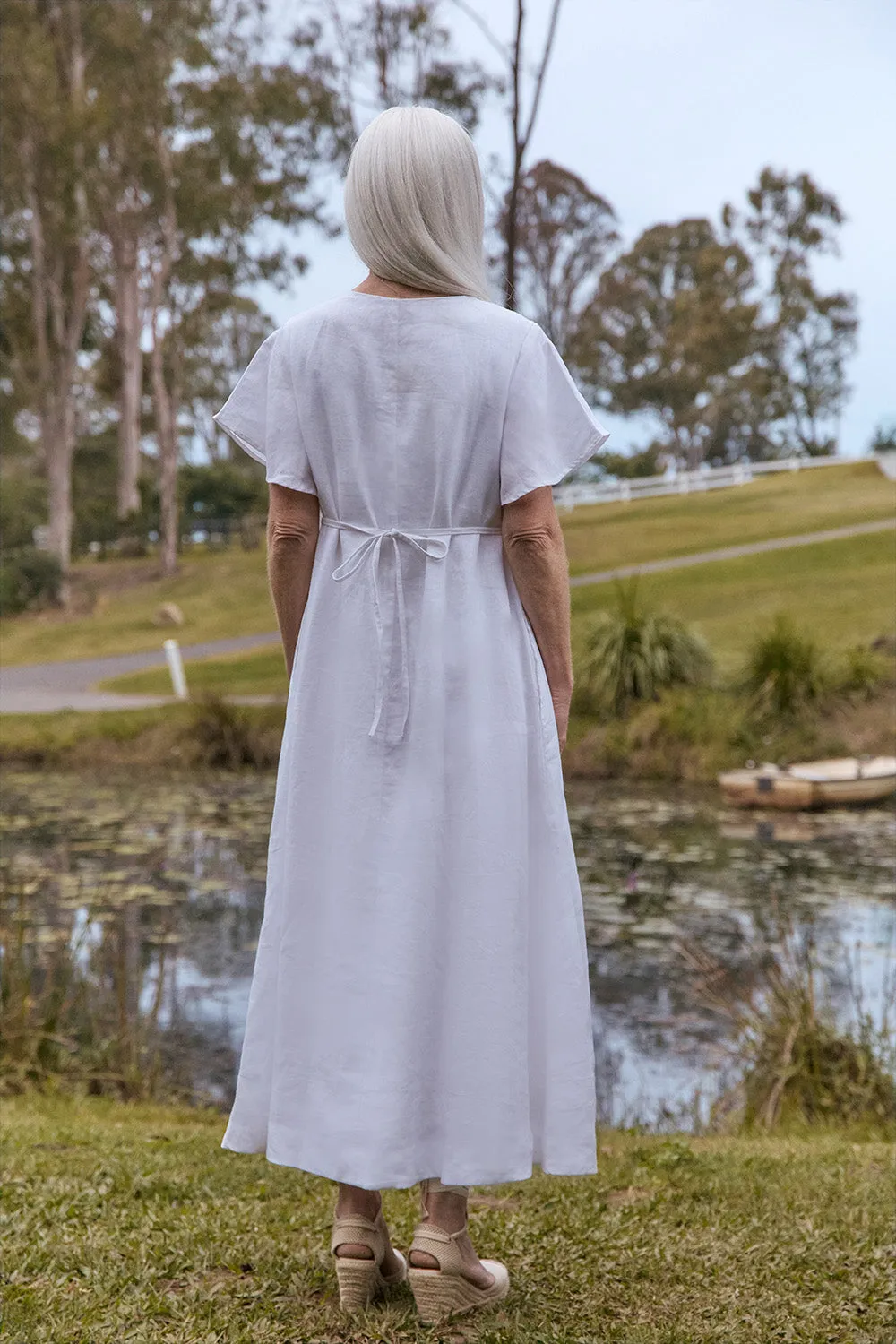Tatum Linen Flutter Sleeve Dress in White sold by Adrift product image thumbnail 5