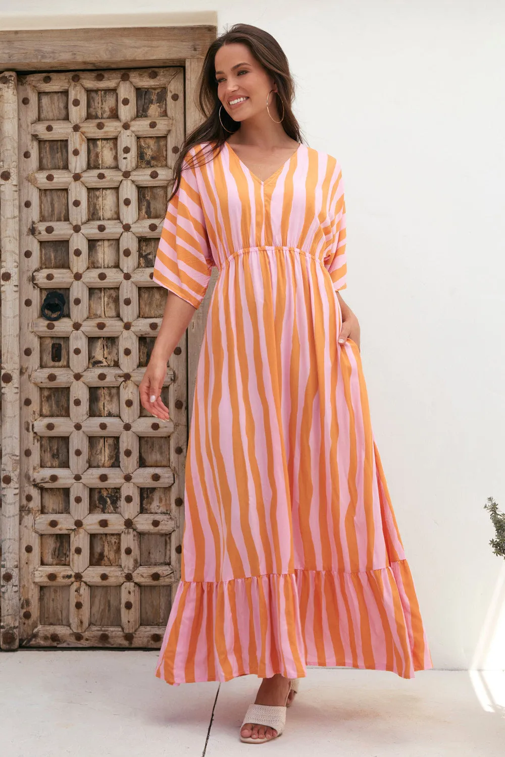 Emily V-Neck Dress in Coral Spring sold by Adrift