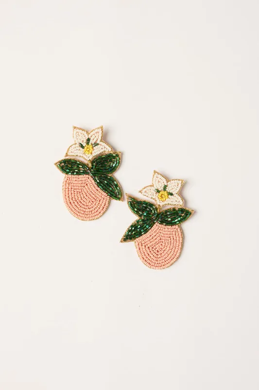 Peach Beaded Earrings in Orange sold by Adrift