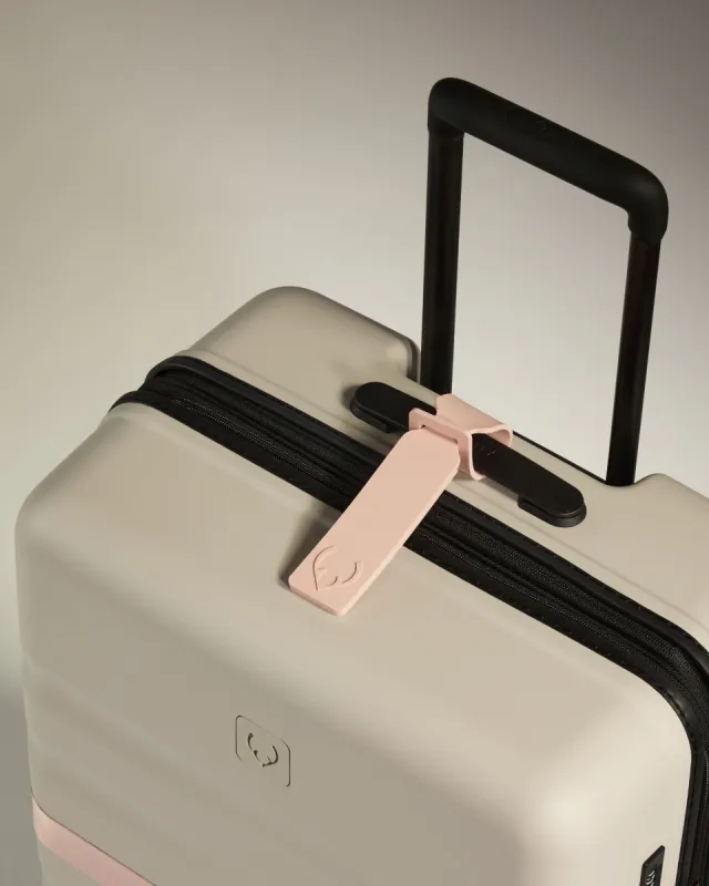 Luggage Tag in Moorland Pink sold by Antler