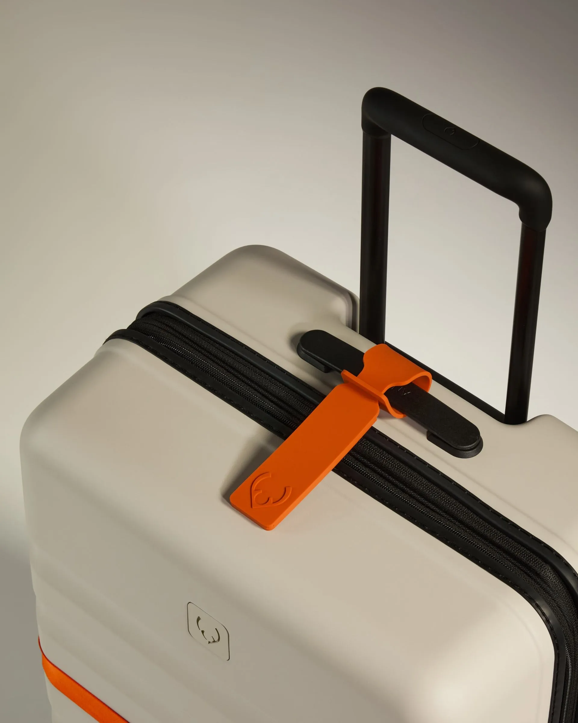 Luggage Tag in Coral sold by Antler