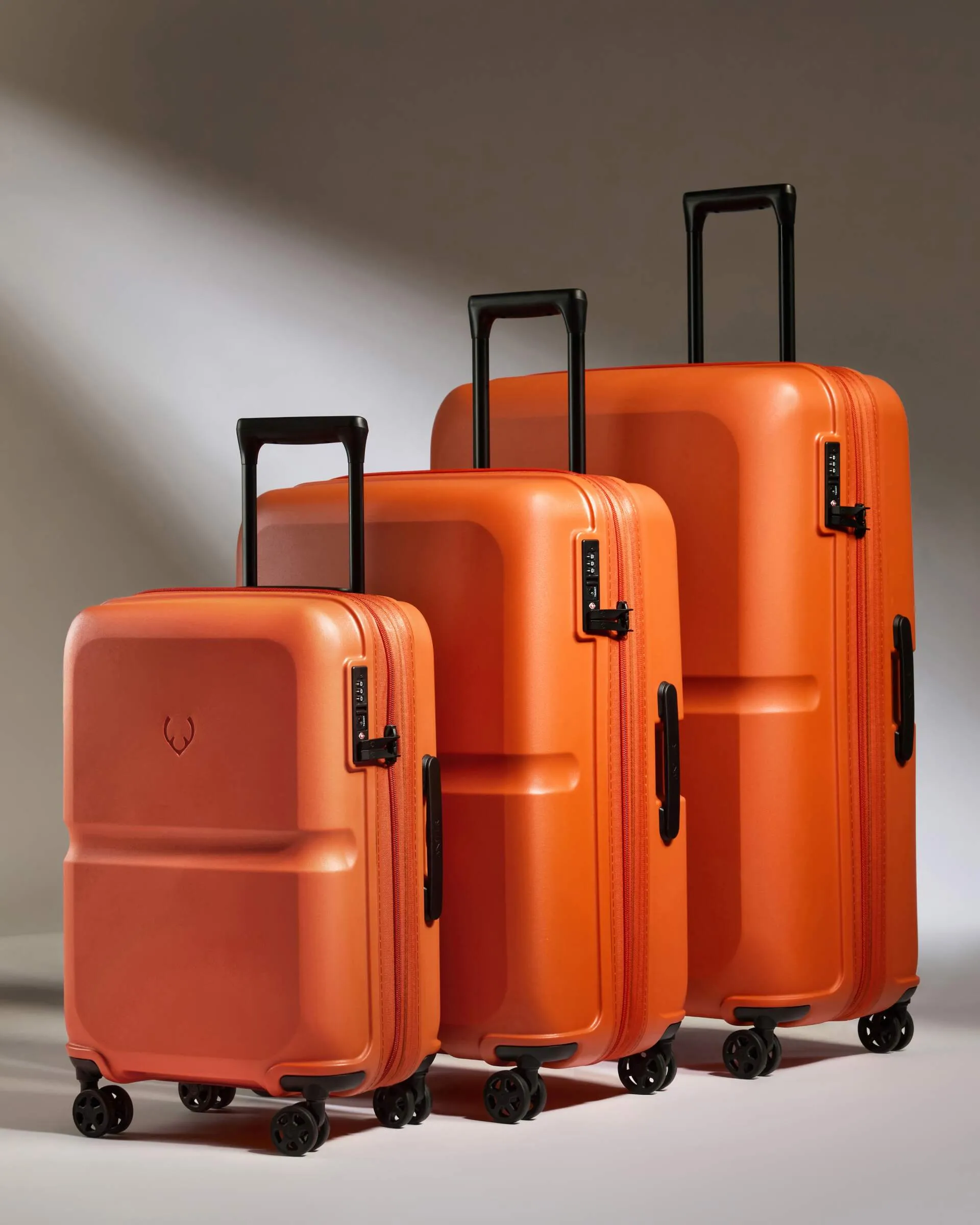 Expandable Carry-on Luggage Set in Ember Orange - Single Stripe sold by Antler