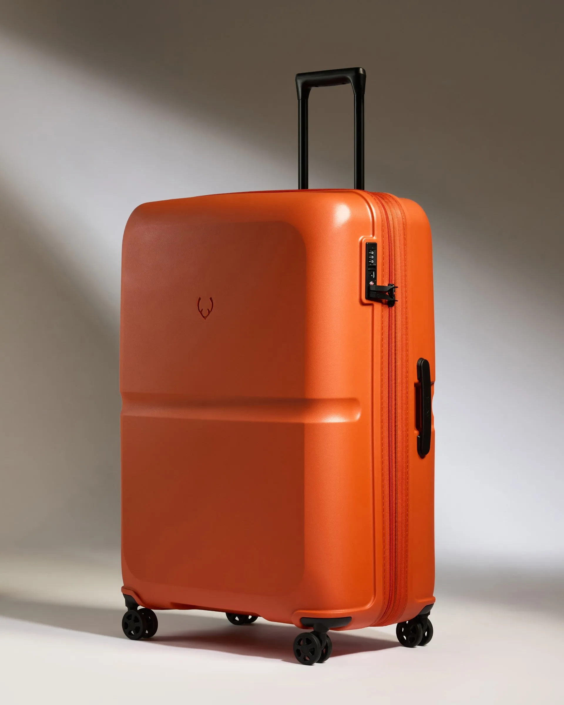 Large Luggage in Ember Orange - Single Stripe sold by Antler