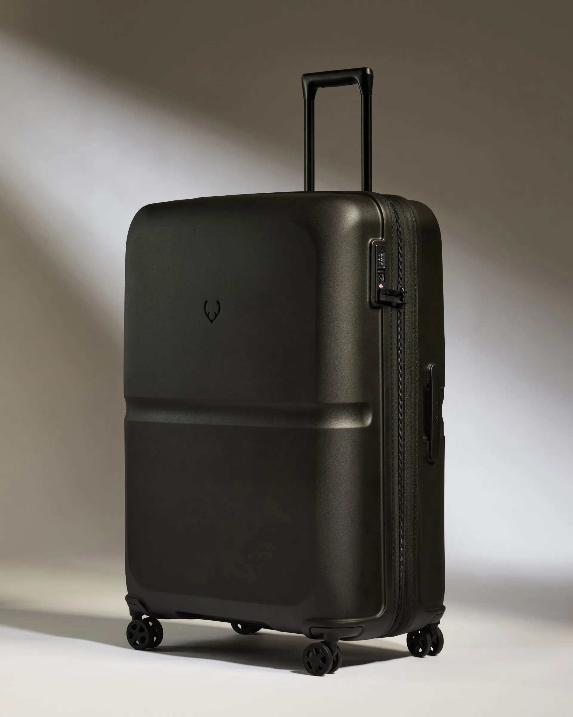 Large Luggage in Black - Single Stripe sold by Antler