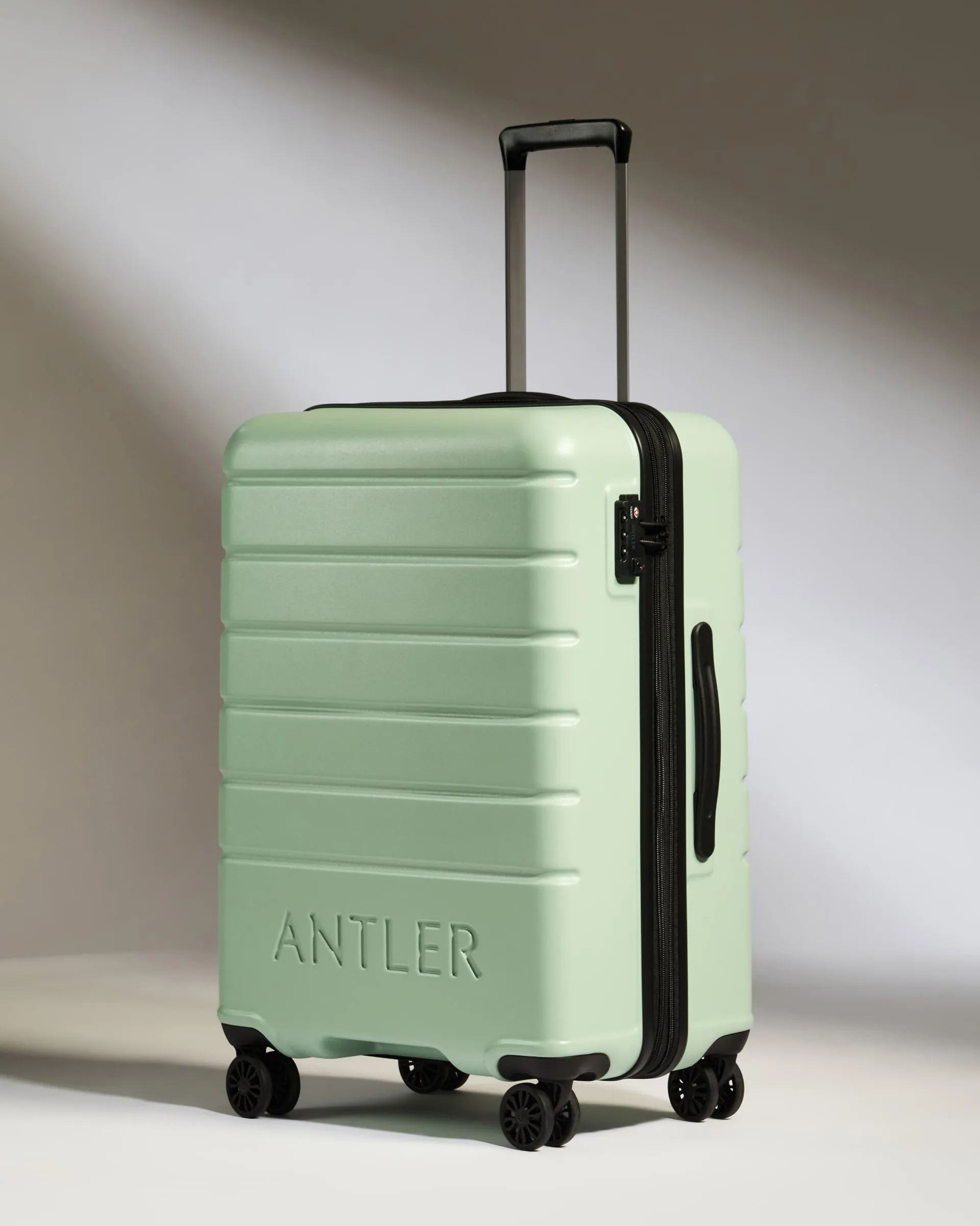 Medium Luggage in Aspen Green - Logo sold by Antler
