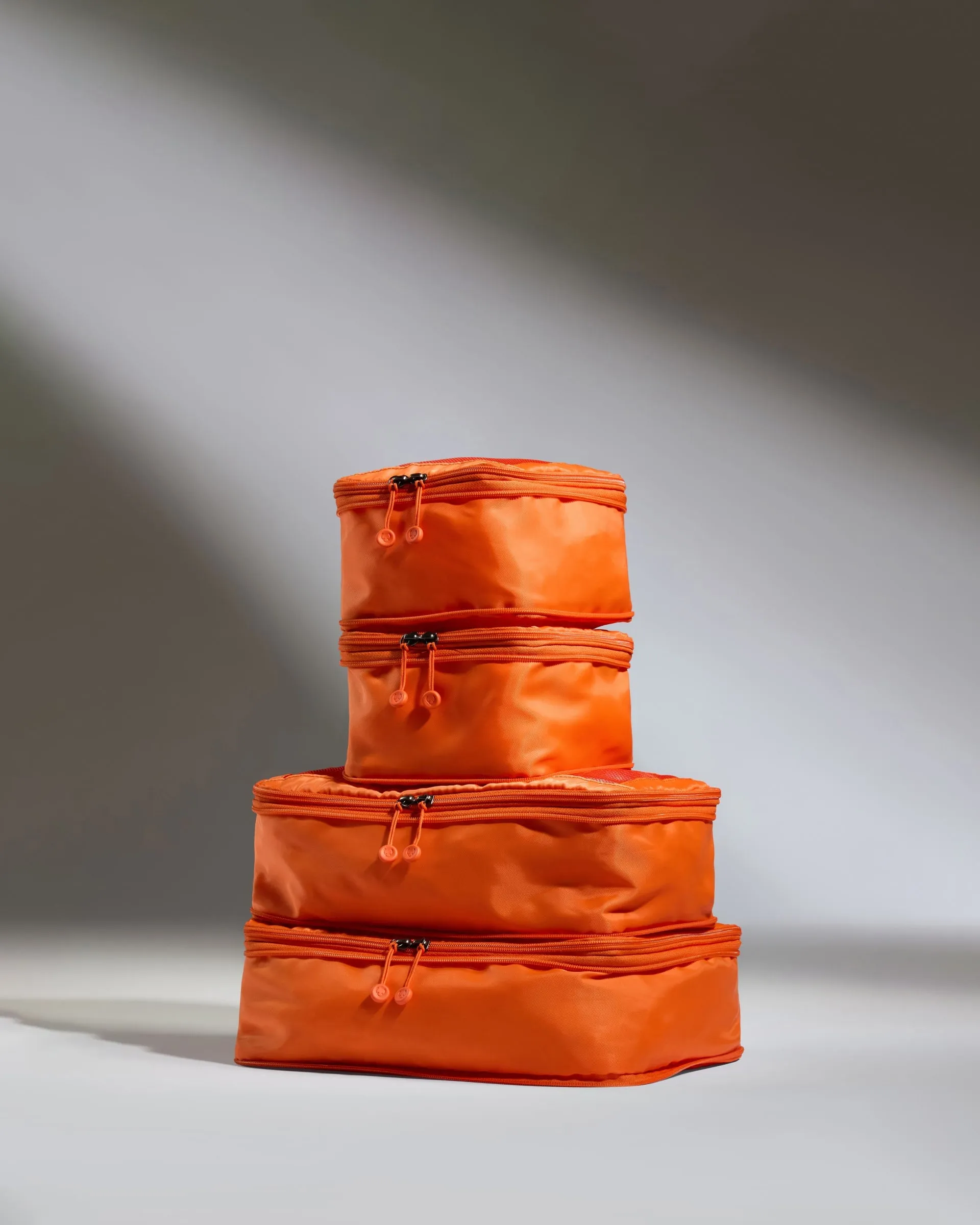 Packing Cubes in Coral - Set of 4 sold by Antler