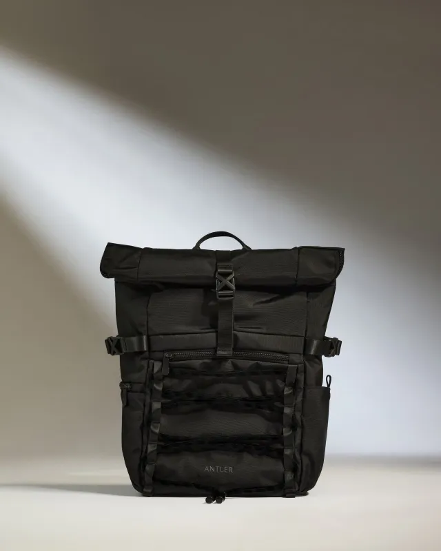 Discovery Roll Top Backpack in Black sold by Antler