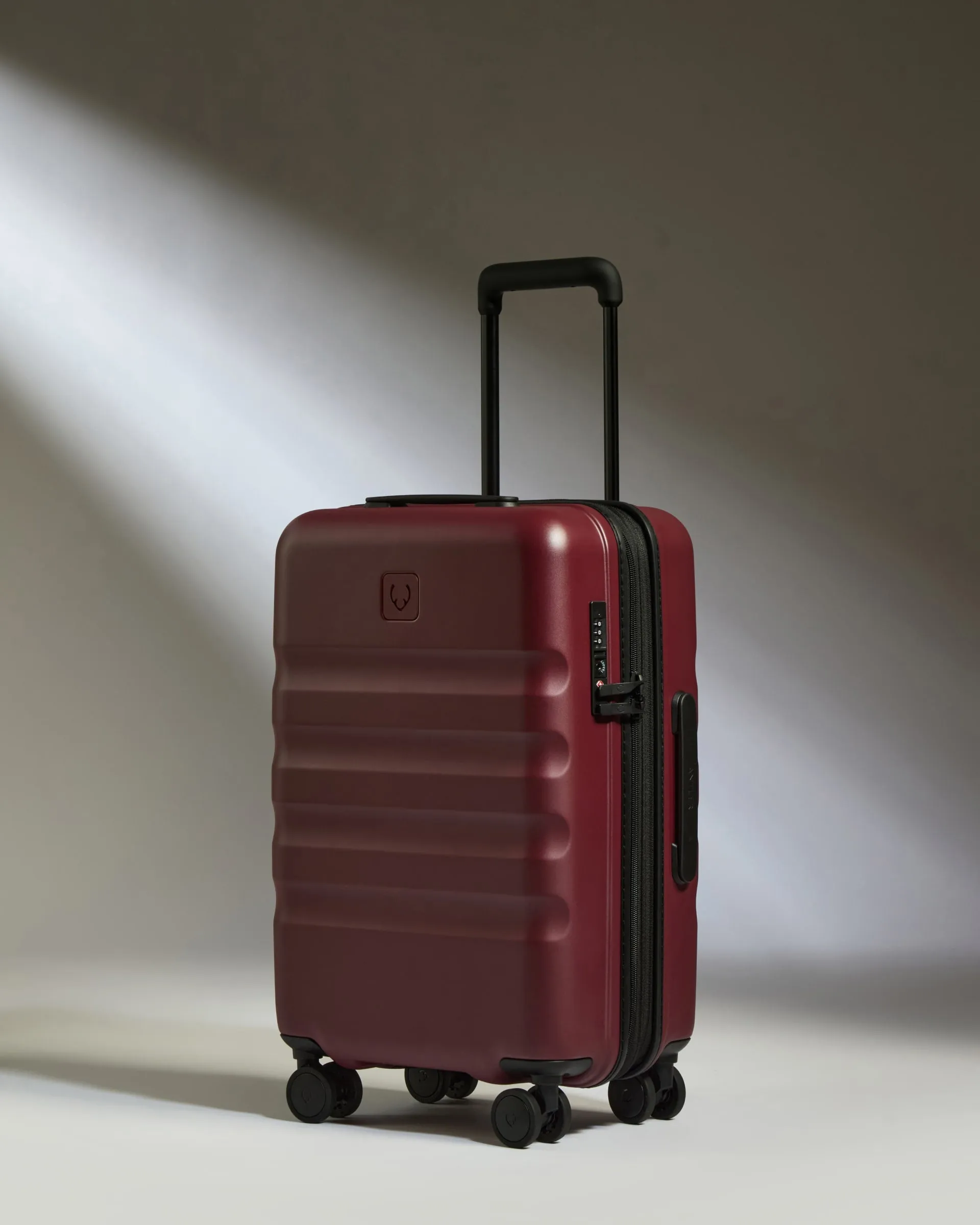 Expandable Carry-on Luggage in Cedar Red - Icon Stripe sold by Antler