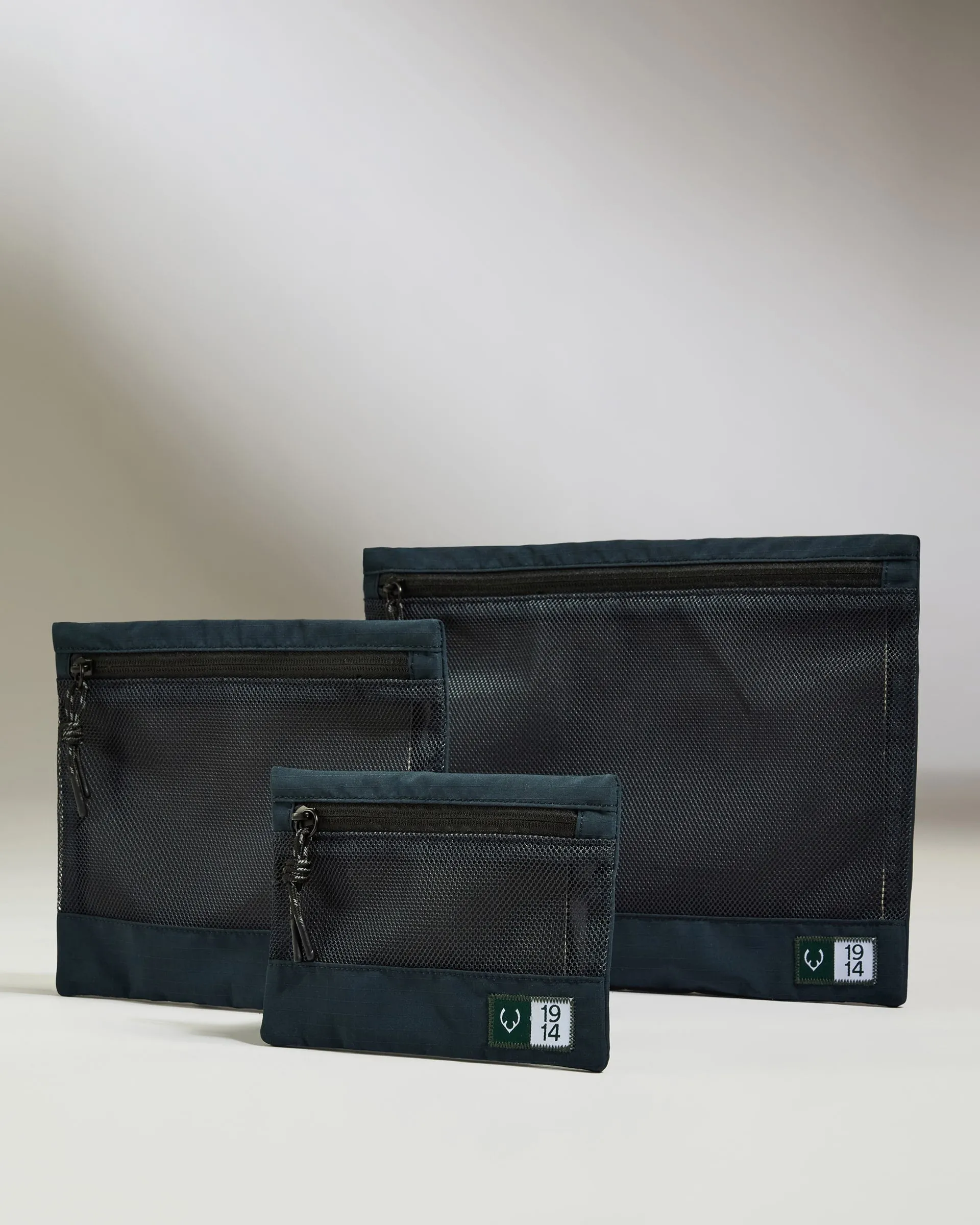 Essential Travel Pouches in Navy - Set of 3 sold by Antler