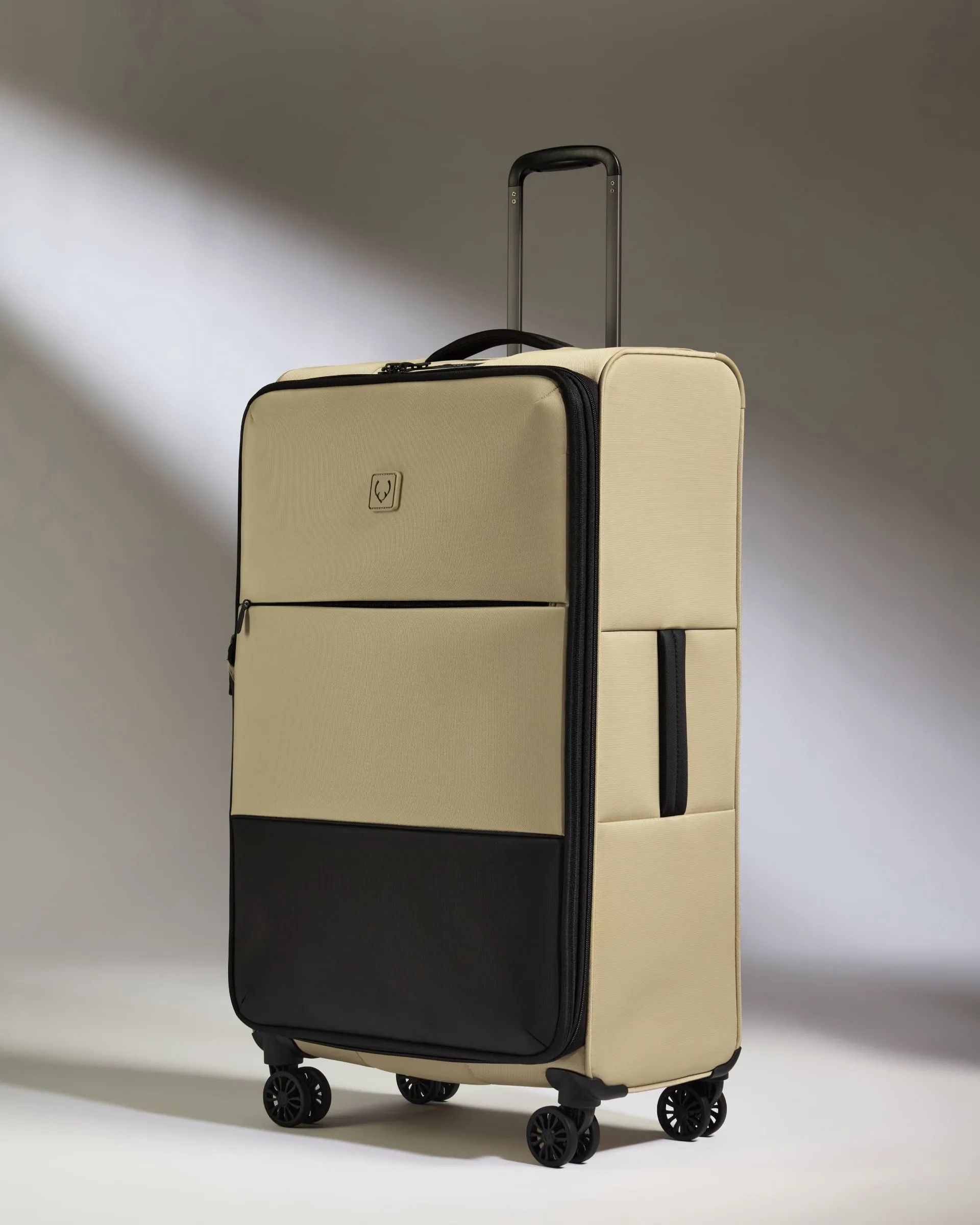 Lightest Large Luggage in Sand - Soft Stripe 2.0 sold by Antler