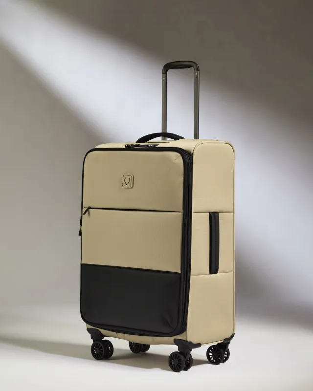Lightest Medium Luggage in Sand - Soft Stripe 2.0 sold by Antler