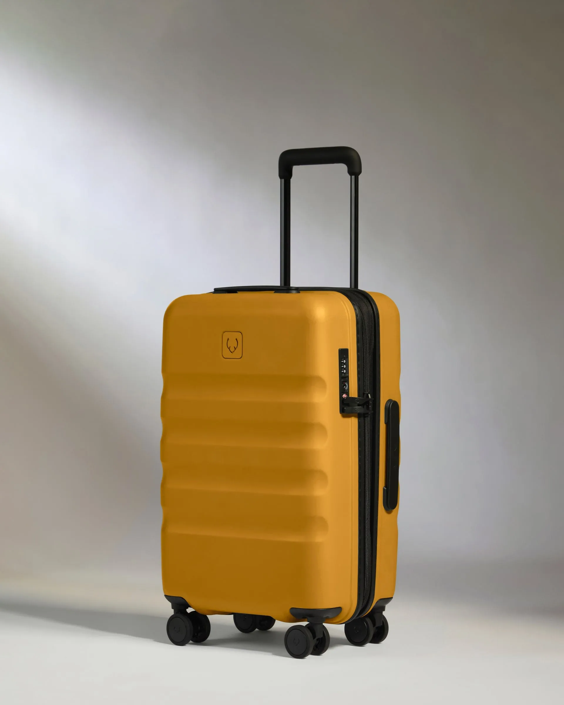 Expandable Carry-on Luggage in Mustard Yellow - Icon Stripe sold by Antler