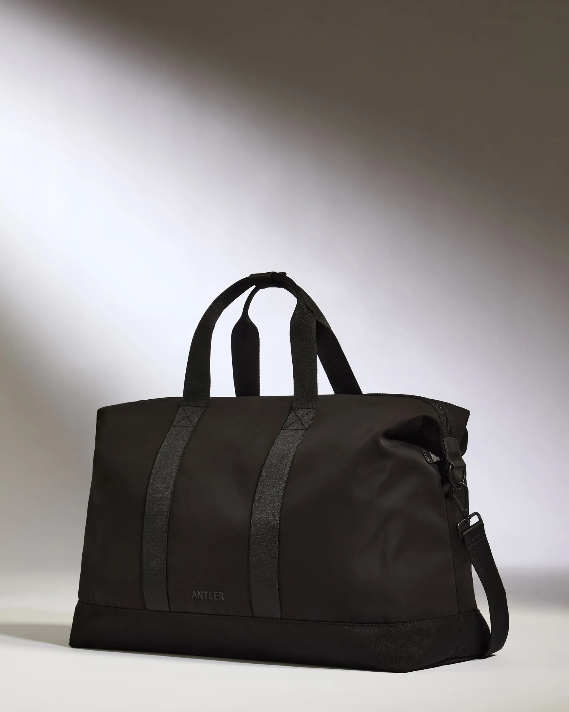 Icon Weekender Bag in Black sold by Antler