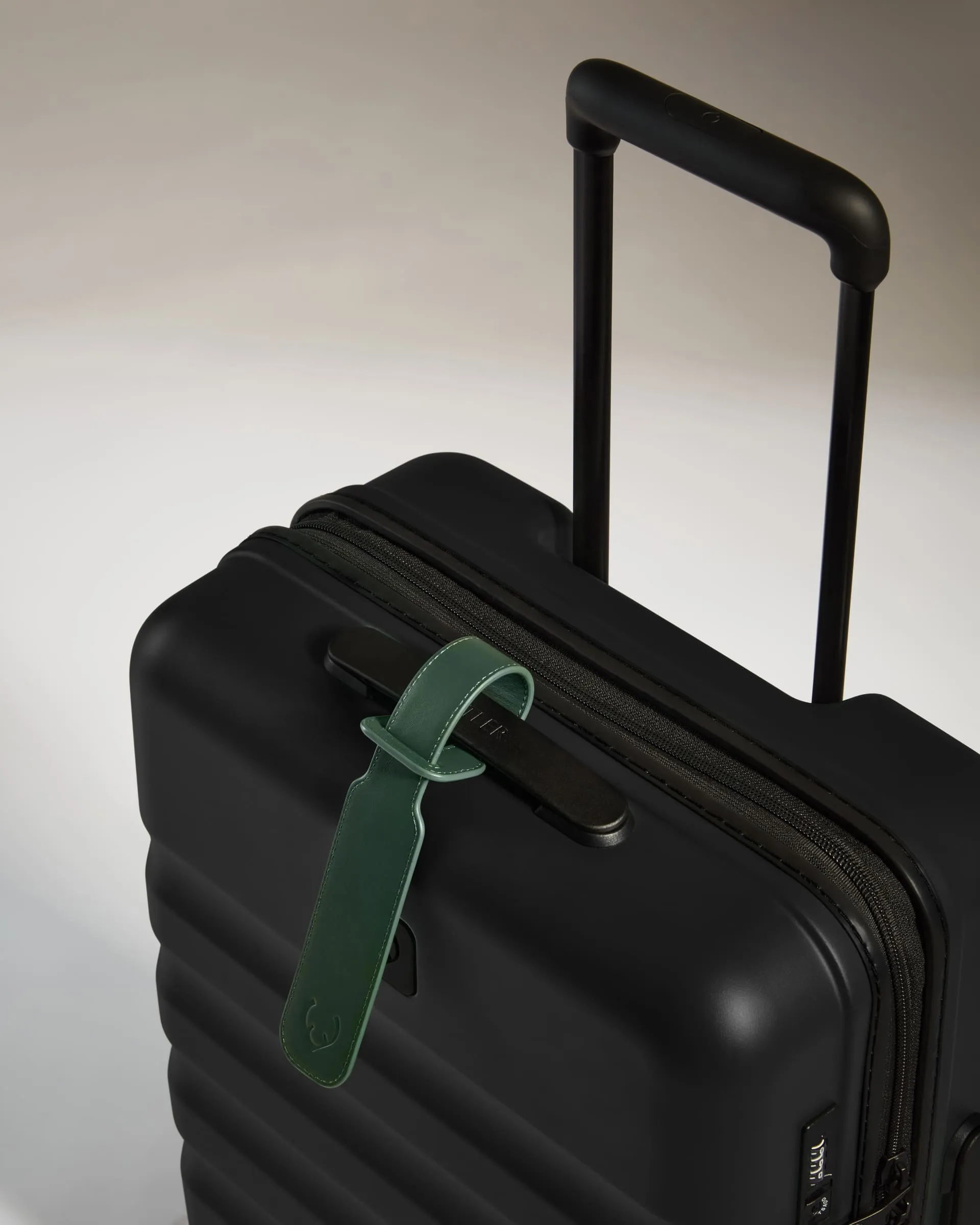 Luggage Tag in Green Leather - 1914 Collection sold by Antler