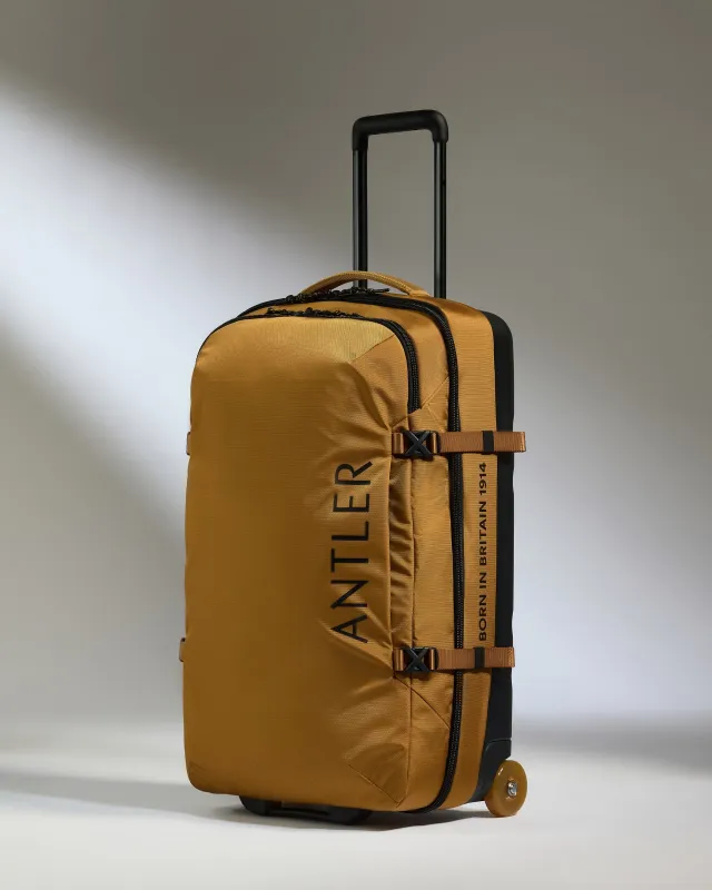 Discovery Wheeled Duffel in Mustard Yellow sold by Antler
