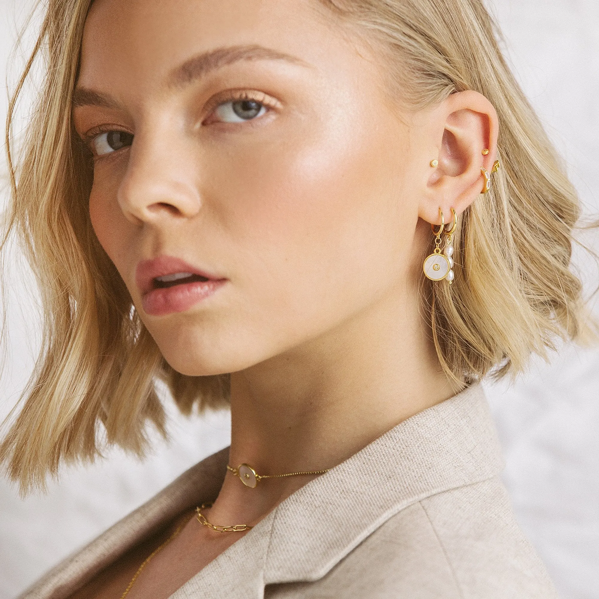 Holi Gold Huggie Earrings sold by Arms Of Eve product image thumbnail 3