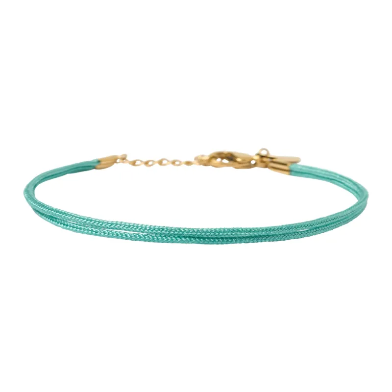 Alphabet String Bracelet - Sky sold by Arms Of Eve
