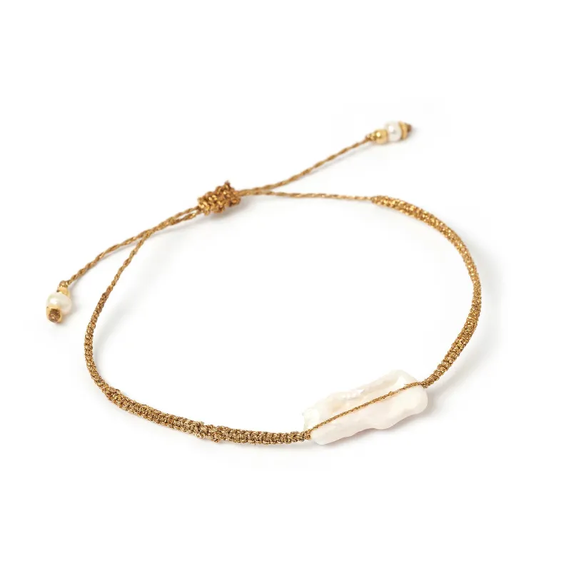 Tulum Pearl and Gold Bracelet sold by Arms Of Eve