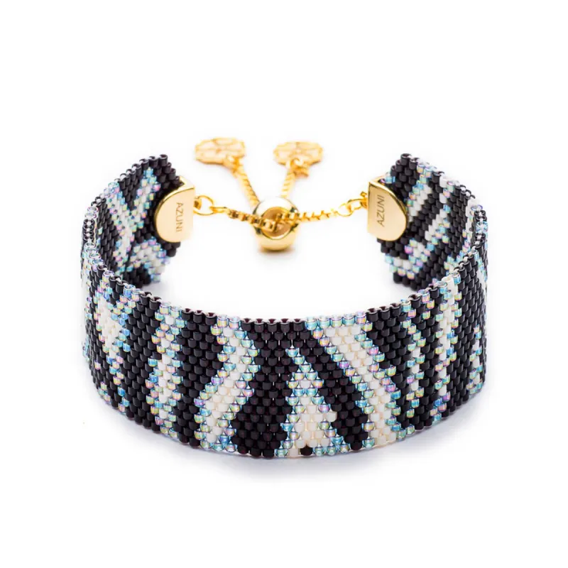 Narrow Zebra Cuff: Black & Cream sold by Azuni London