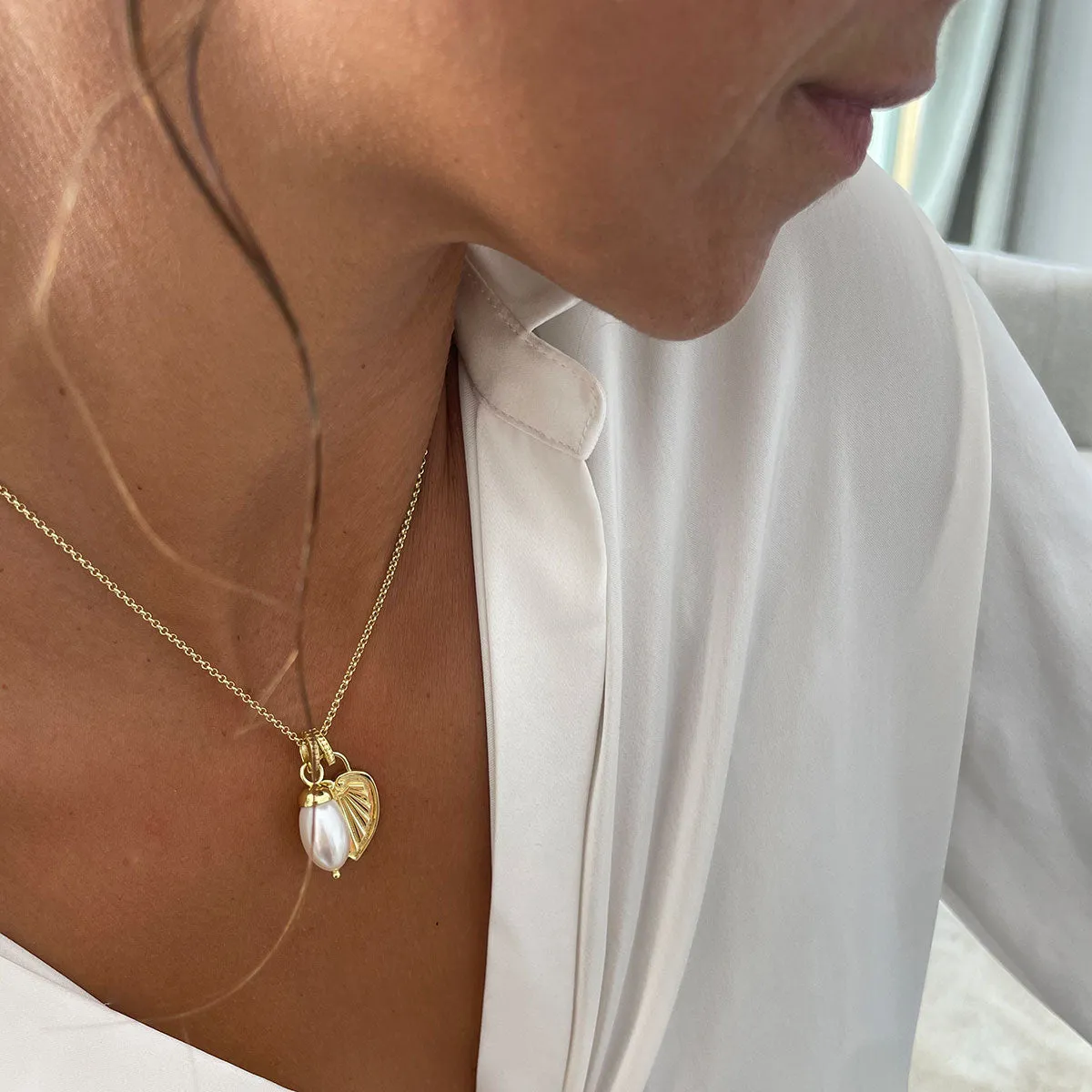 Aphrodite Pearl & Palm Leaf Necklace sold by Azuni London product image thumbnail 2